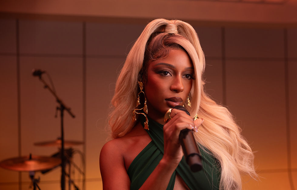 Still image from Victoria Monét's live performance of "How Does It Make You Feel"