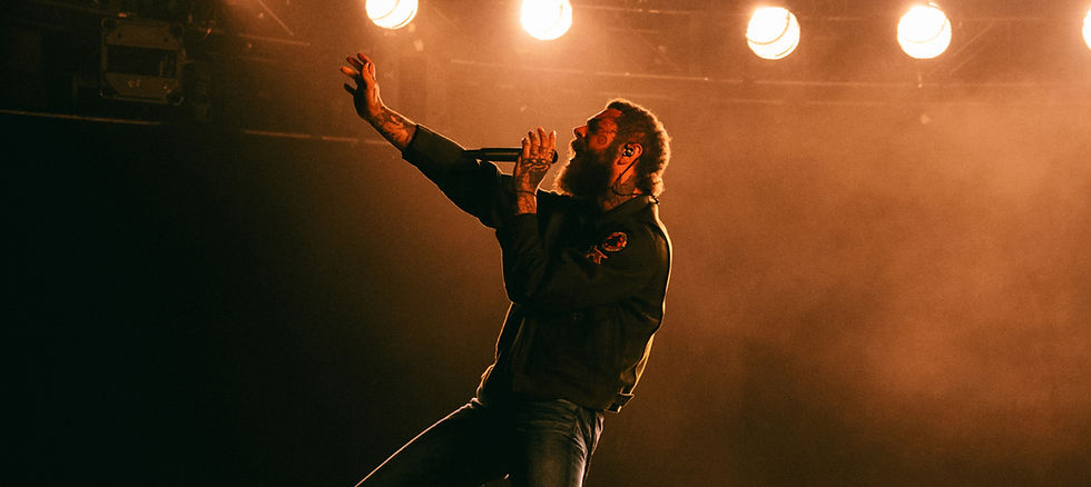 Still image from Post Malone's "AUSTIN" live performance video presented by Vevo